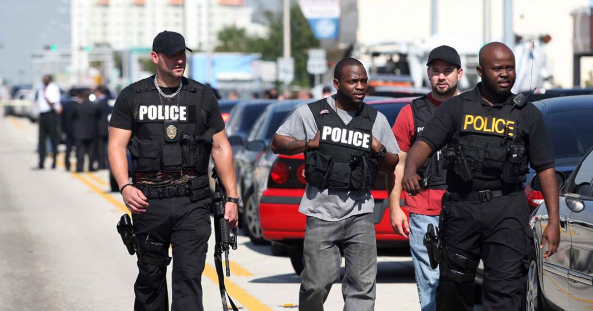 Black police white teen suspect taken photos