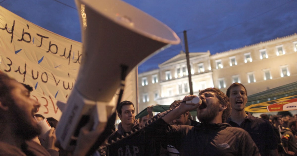 Protesters Gather In Front Of Greece S Parliament As Lawmakers Consider