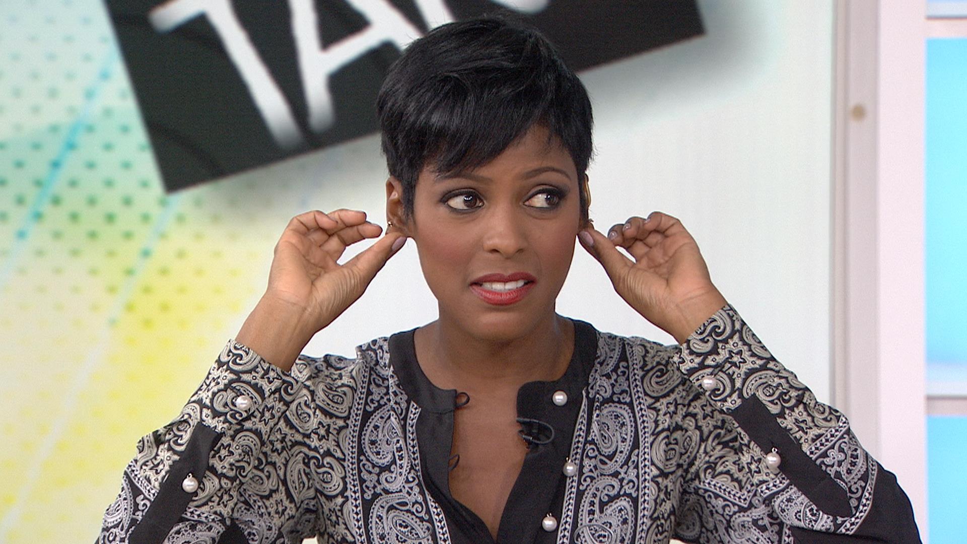 Tamron Hall reveals emergency ear repair after earring mishap, shows off br...