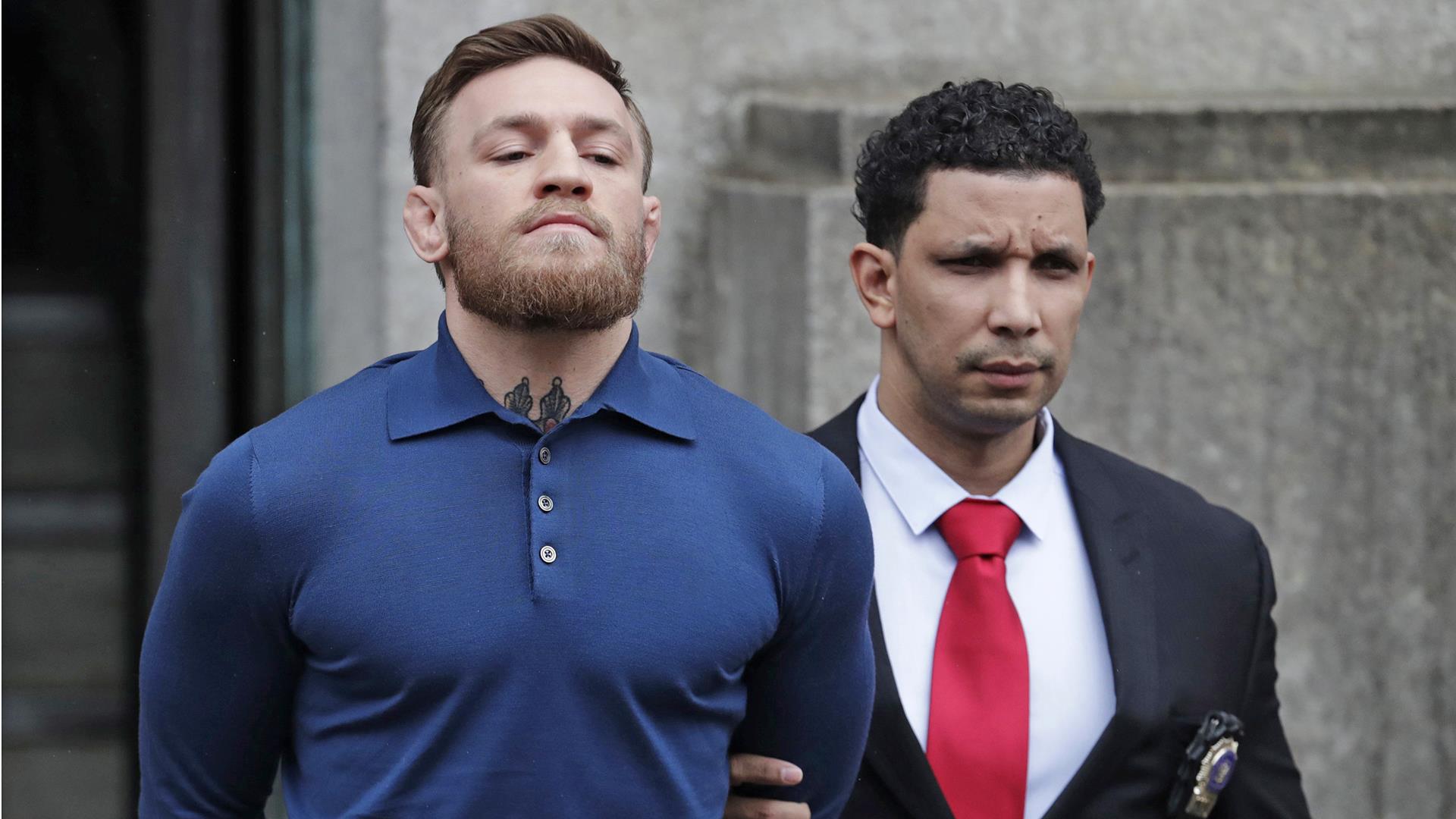 MMA star Conor McGregor arrested after attacking bus