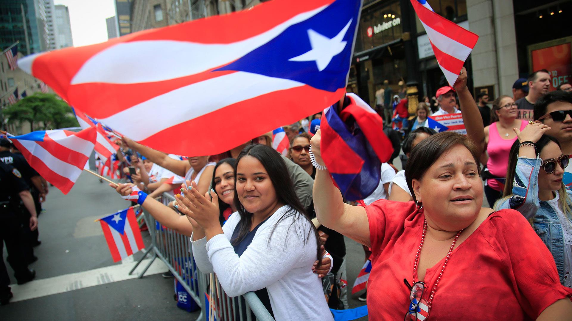Thousands show Puerto Rican pride in first parade since Hurricane Maria.