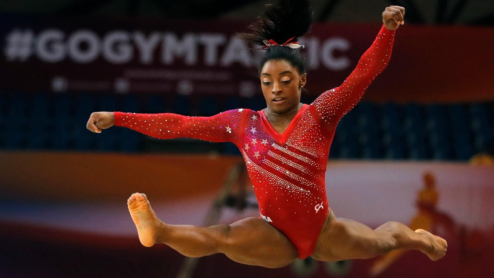Гимнаст сеул. Спортивная гимнастика негритянка.
