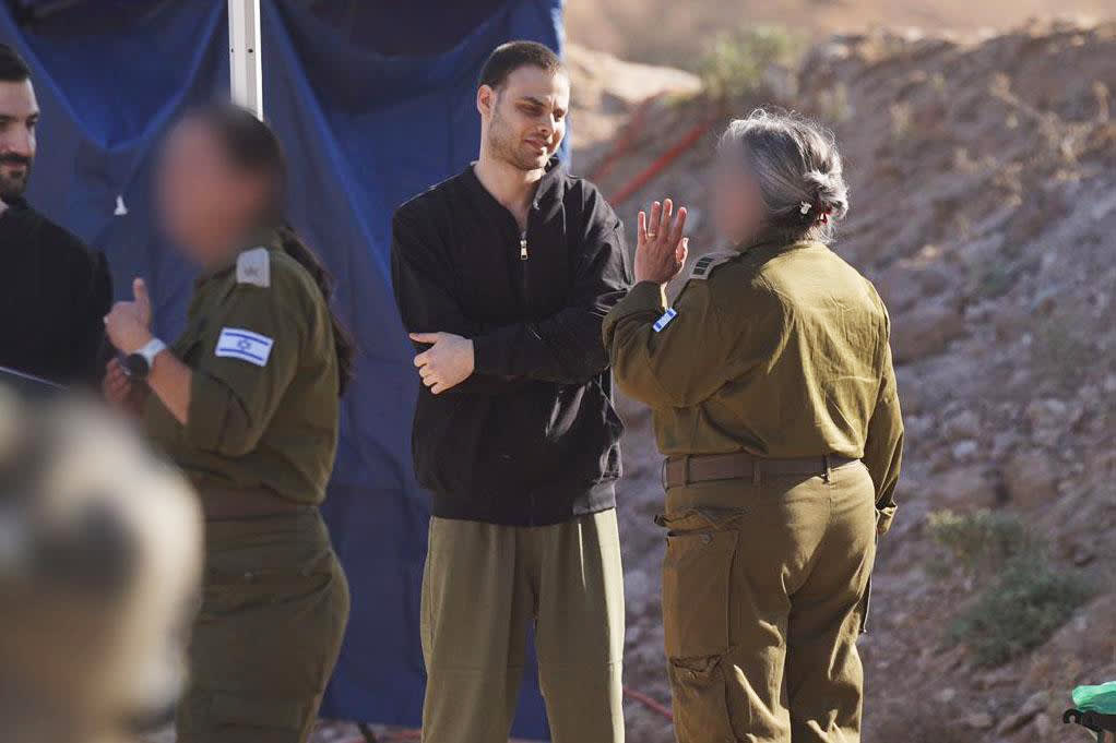 Israeli hostages cross back from Gaza into Israel on Oct. 13, 2025.