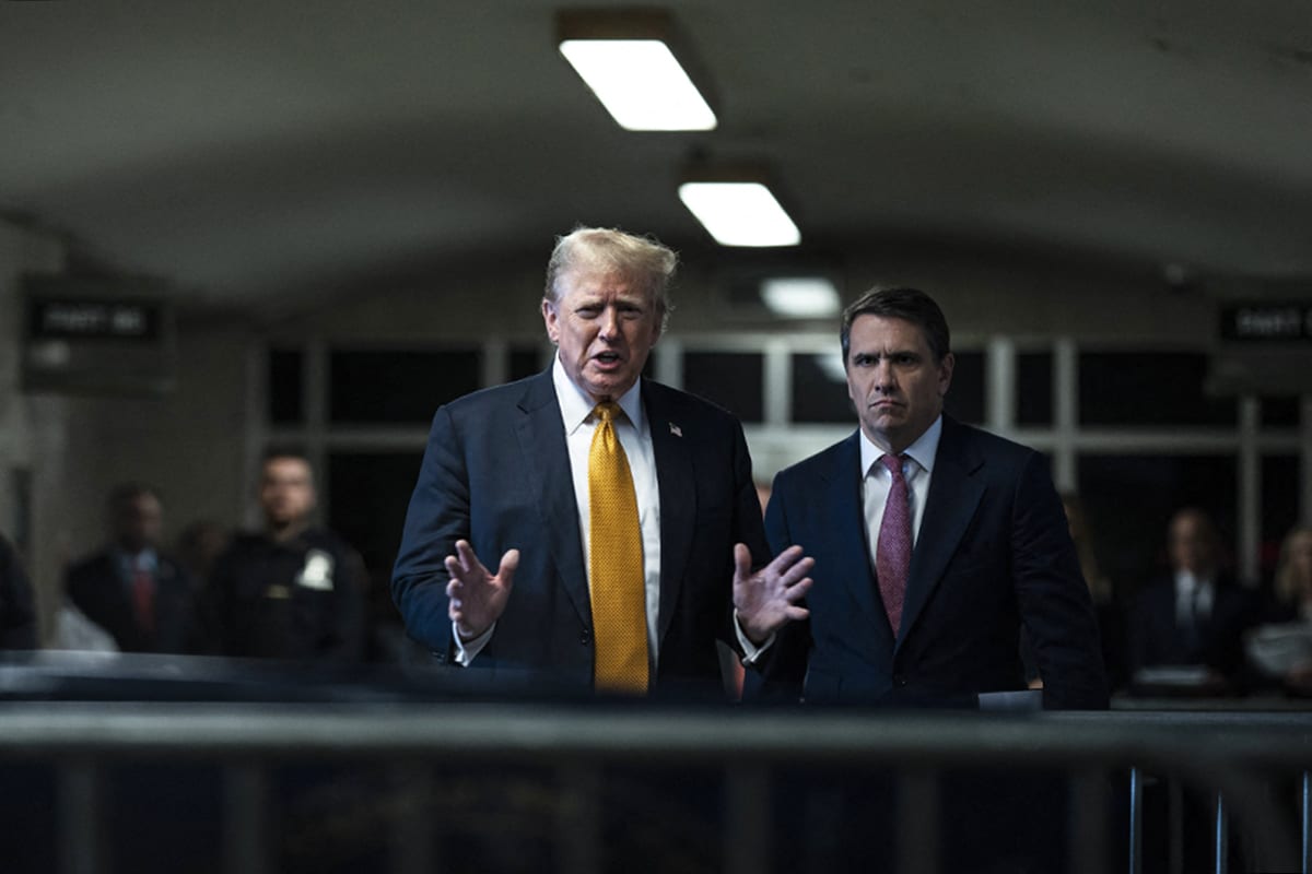 Donald Trump speaks to reporters