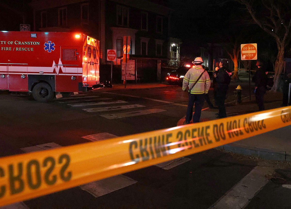 Emergency personnel gather at Hope and Waterman Streets at Brown University in Providence, R.I., Saturday, Dec. 13, 2025, during reports of a shooting. 
