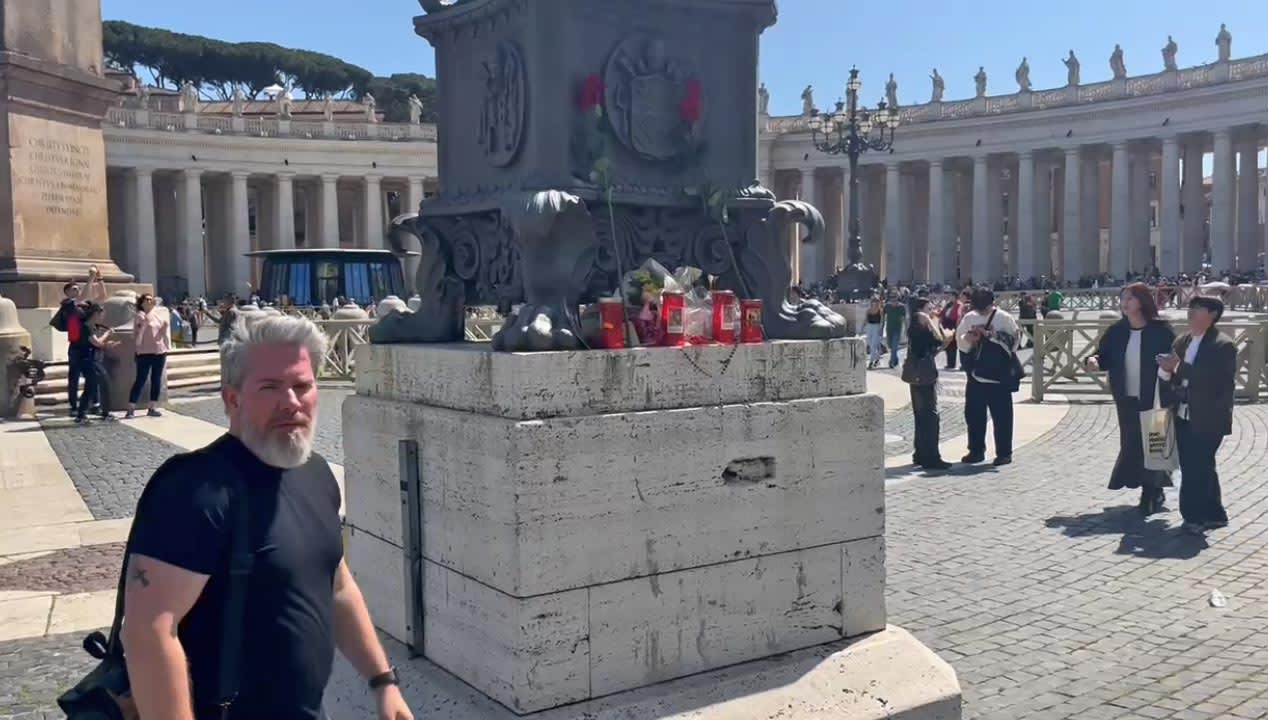 Daniel Zavareze after placing a photo of his family in St. Peter's Square.
