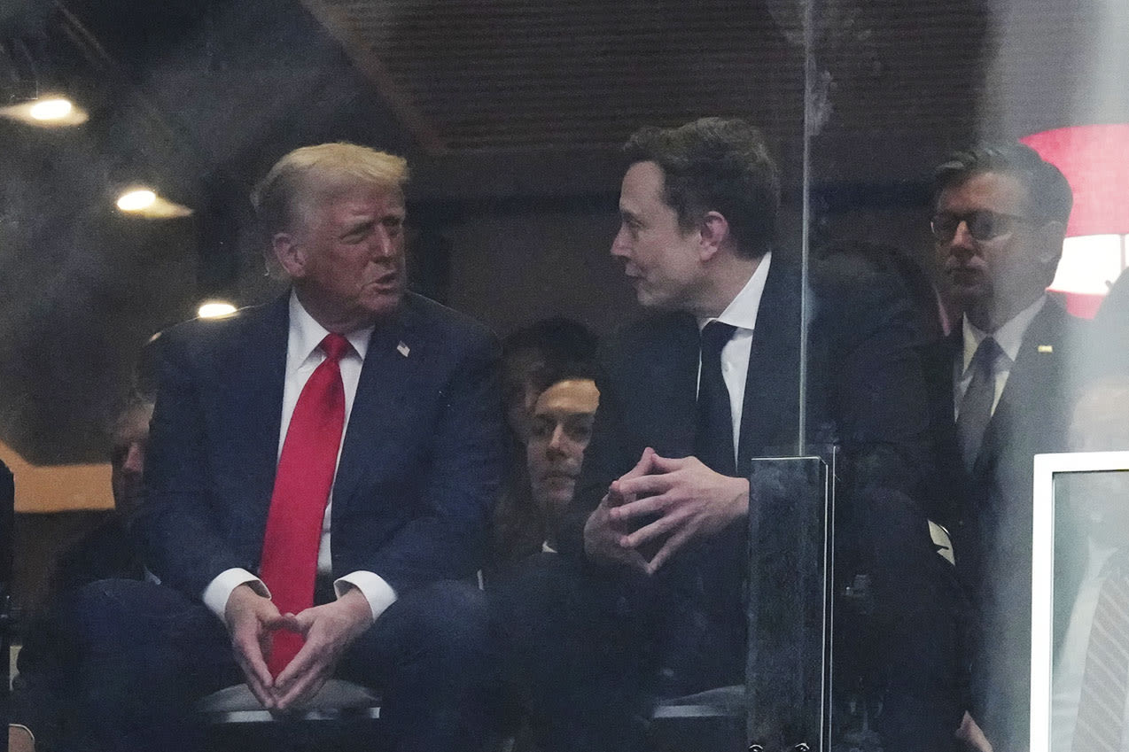 President Donald Trump and Elon Musk talk at a memorial for Charlie Kirk, Sunday, Sept. 21, 2025, at State Farm Stadium in Glendale, Ariz. 