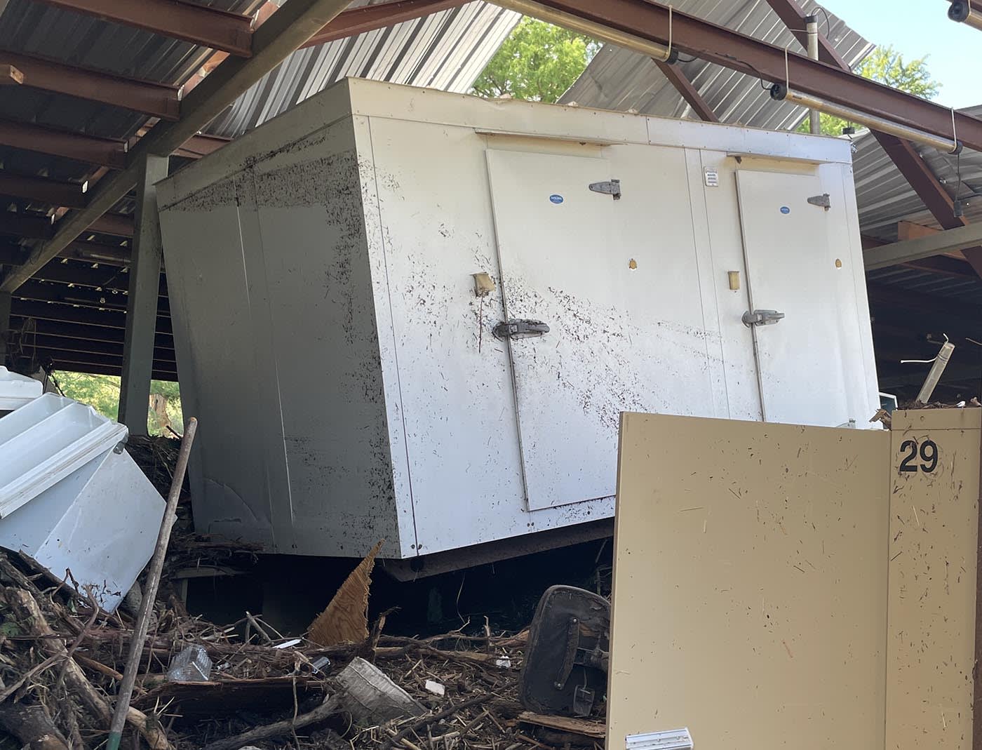 A cooler that pushed through Andi Fell’s home when it was lifted by water.