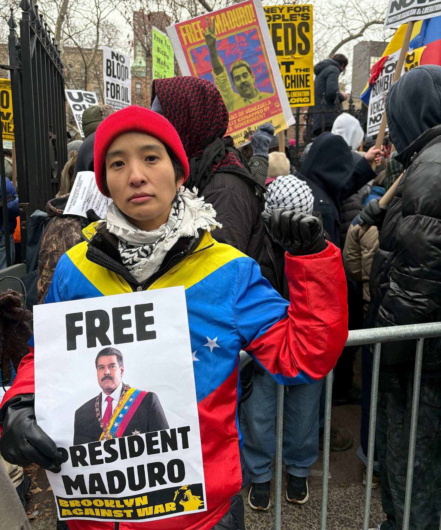 Rae Lee and other protesters call for Maduro's release.