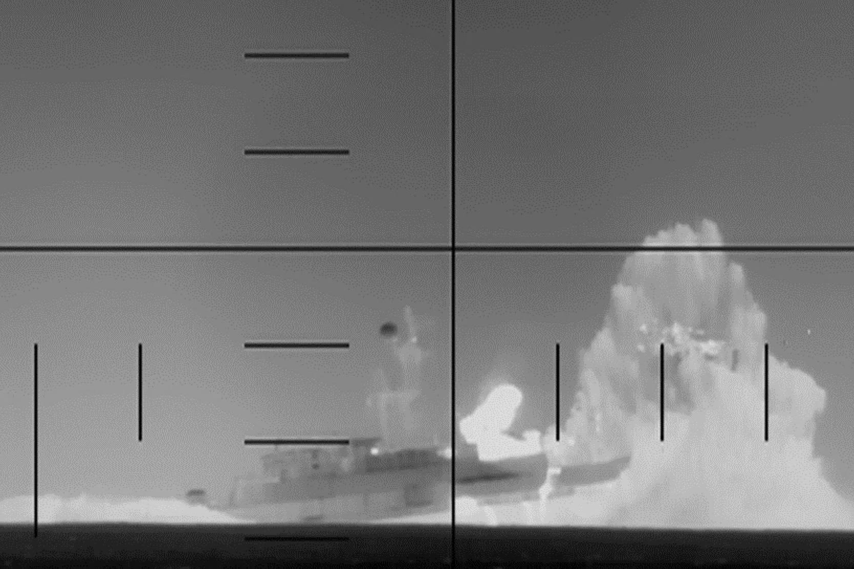 The Department of Defense says periscope footage shows a U.S. Navy submarine firing on and sinking an Iranian warship in the Indian Ocean.