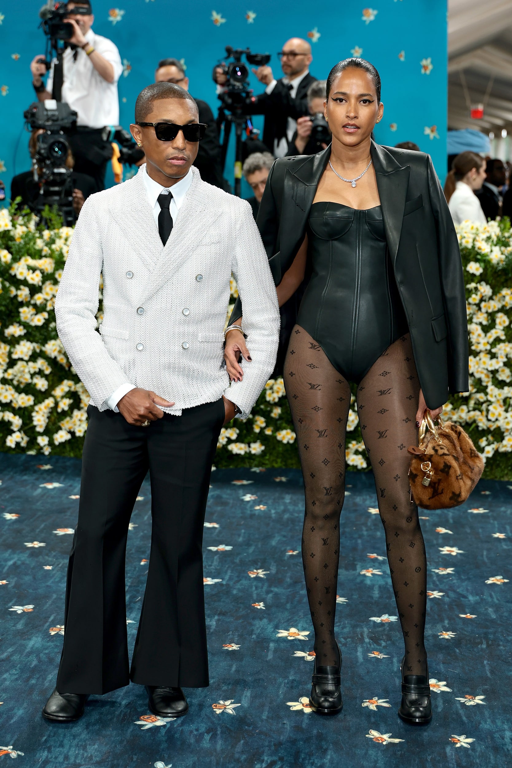 Pharrell Williams and Helen Lasichanh