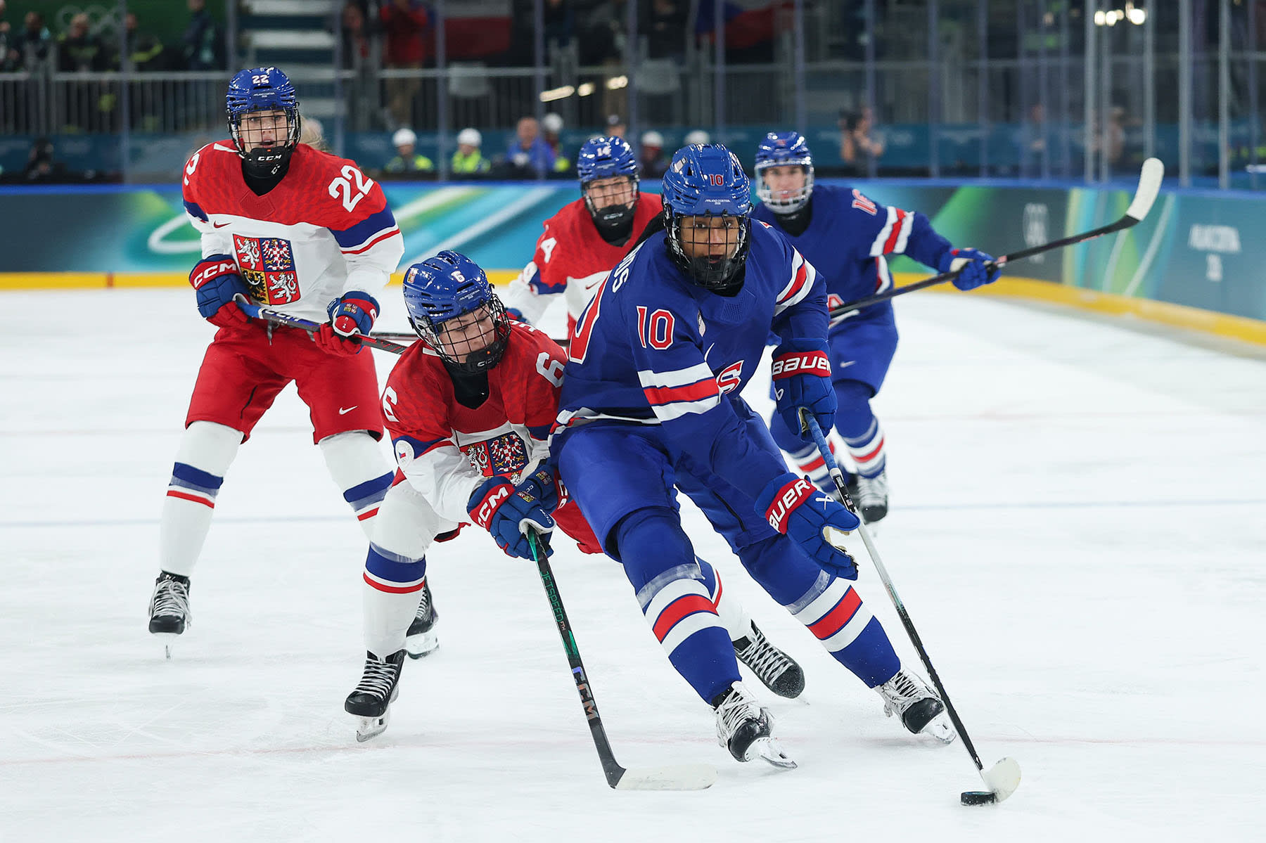 Laila Edwards of the U.S. skates with the puck against Czechia 