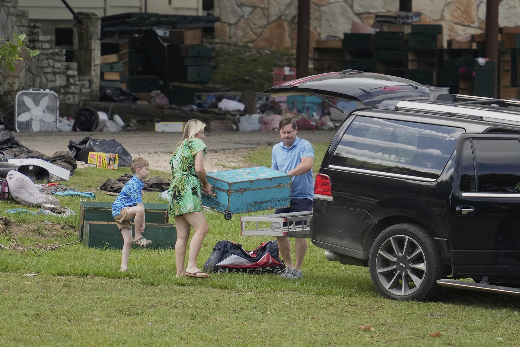 People come to pick up items at Camp Mystic