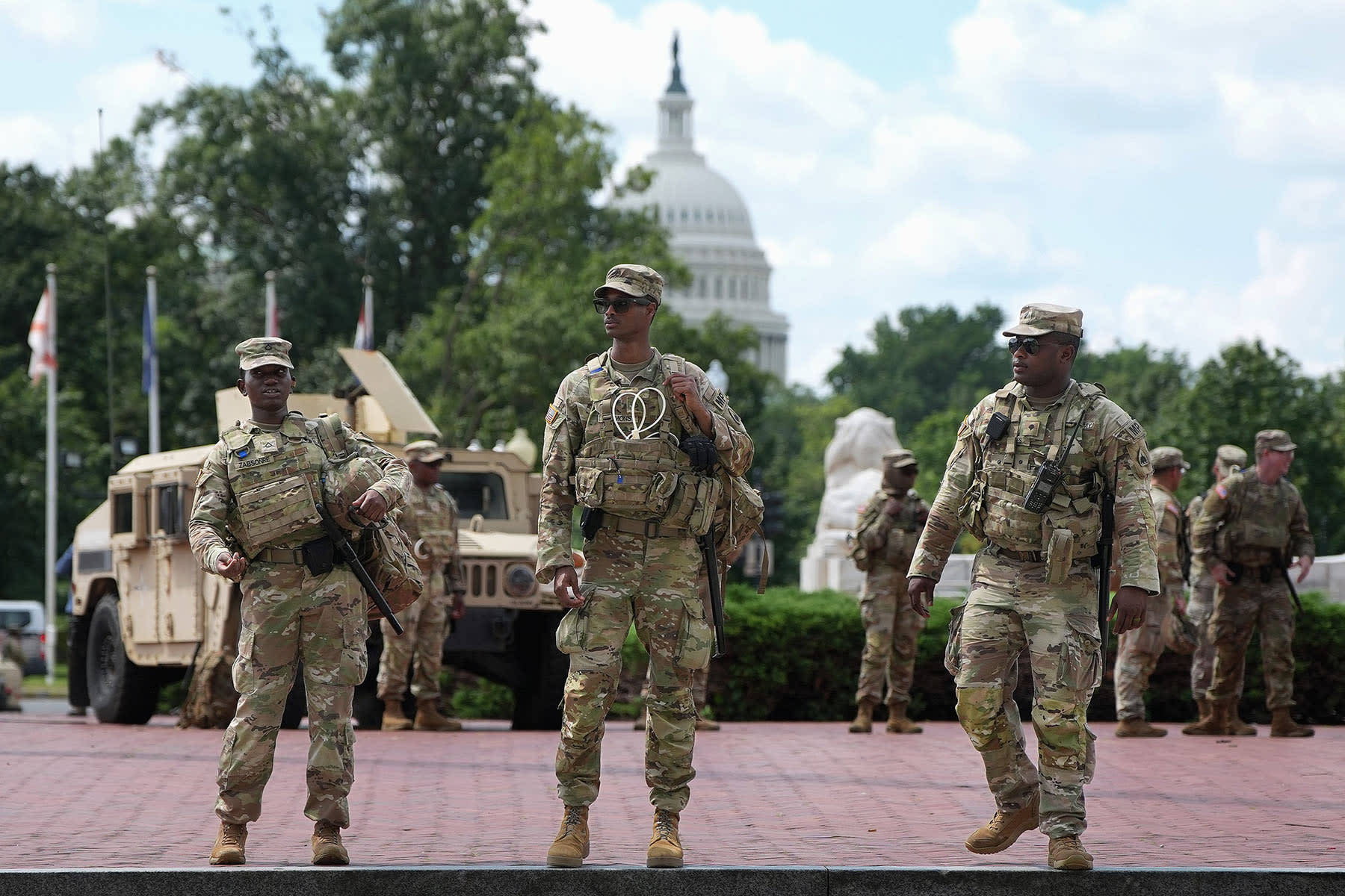 Members of the National Guard stand outside Union Station on Aug. 14, 2025 in Washington, D.C.