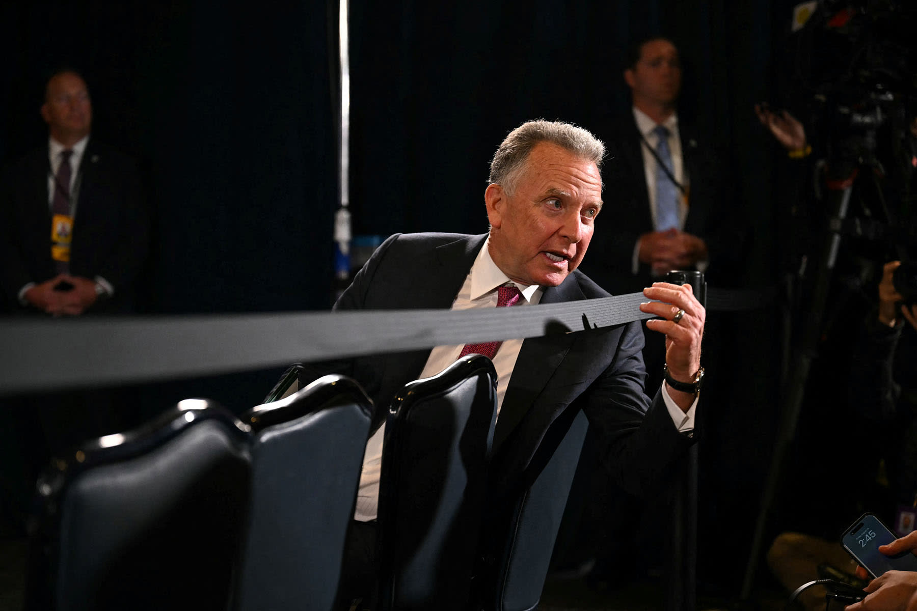 U.S. special envoy Steve Witkoff speaks with staff as he waits to attend President Donald Trump and Russian President Vladimir Putin's joint press conference in Anchorage, Alaska, on Aug. 15, 2025.