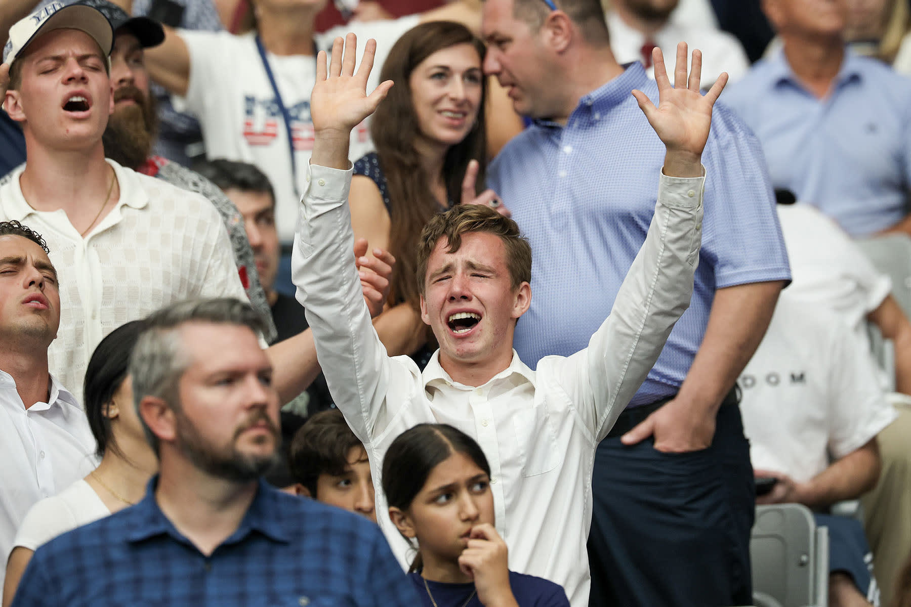 Audience members become emotional during the memorial service for political activist Charlie Kirk 