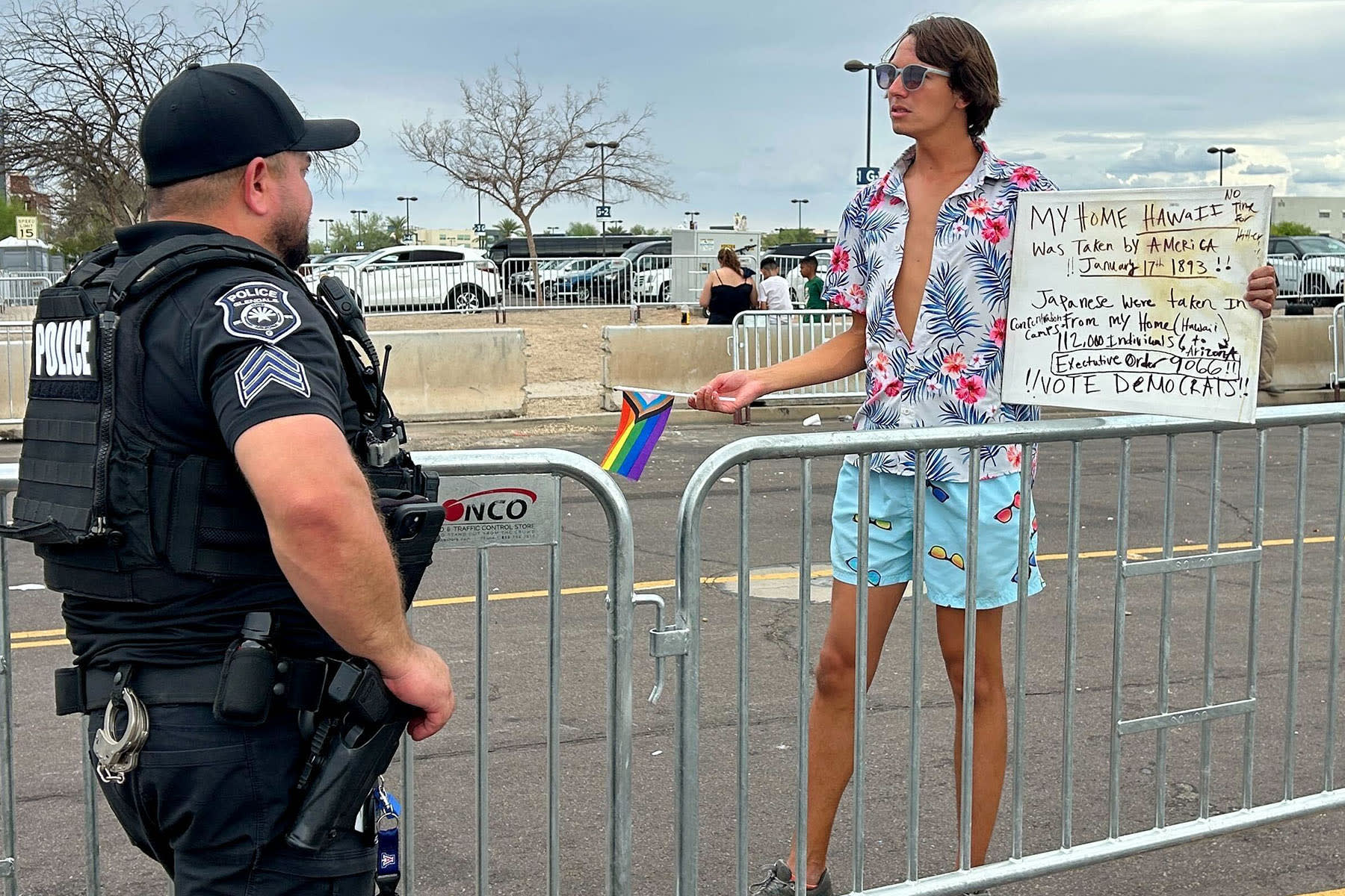 A protester in the designated protest zone at the Charlie Kirk memorial.