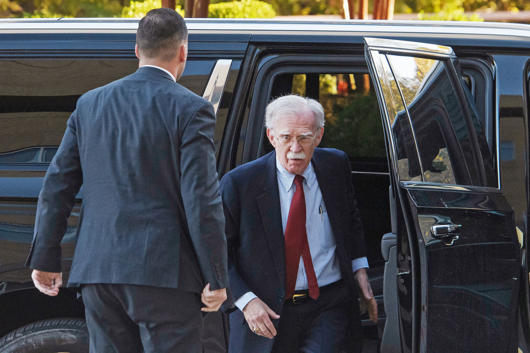 Former Trump administration national security adviser John Bolton arrives for his arraignment at the Greenbelt Federal Courthouse in Greenbelt, Md., Friday, Oct. 17, 2025.