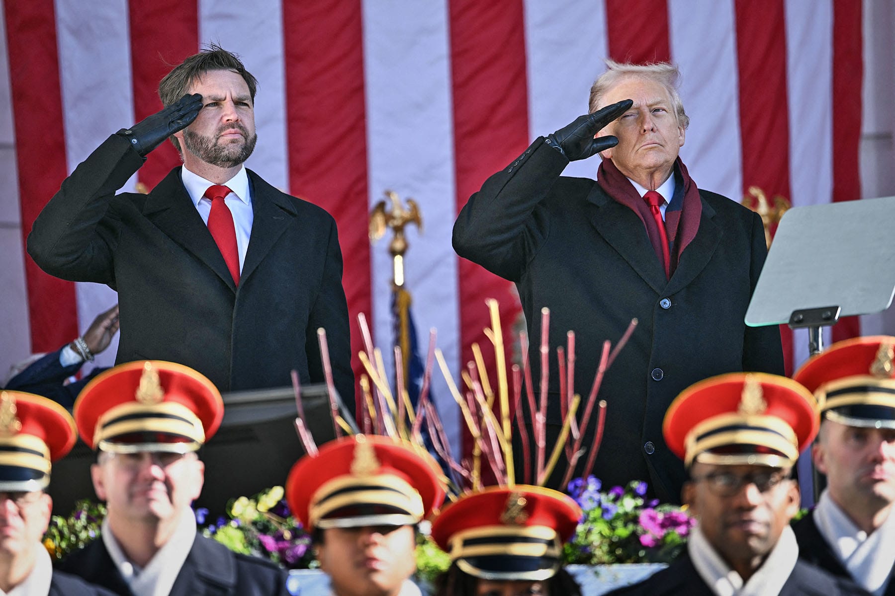 President Donald Trump and Vice President JD Vance salute at the conclusion of a Veterans Day ceremony at Arlington National Cemetery in Arlington, Va., on Nov. 11, 2025. 