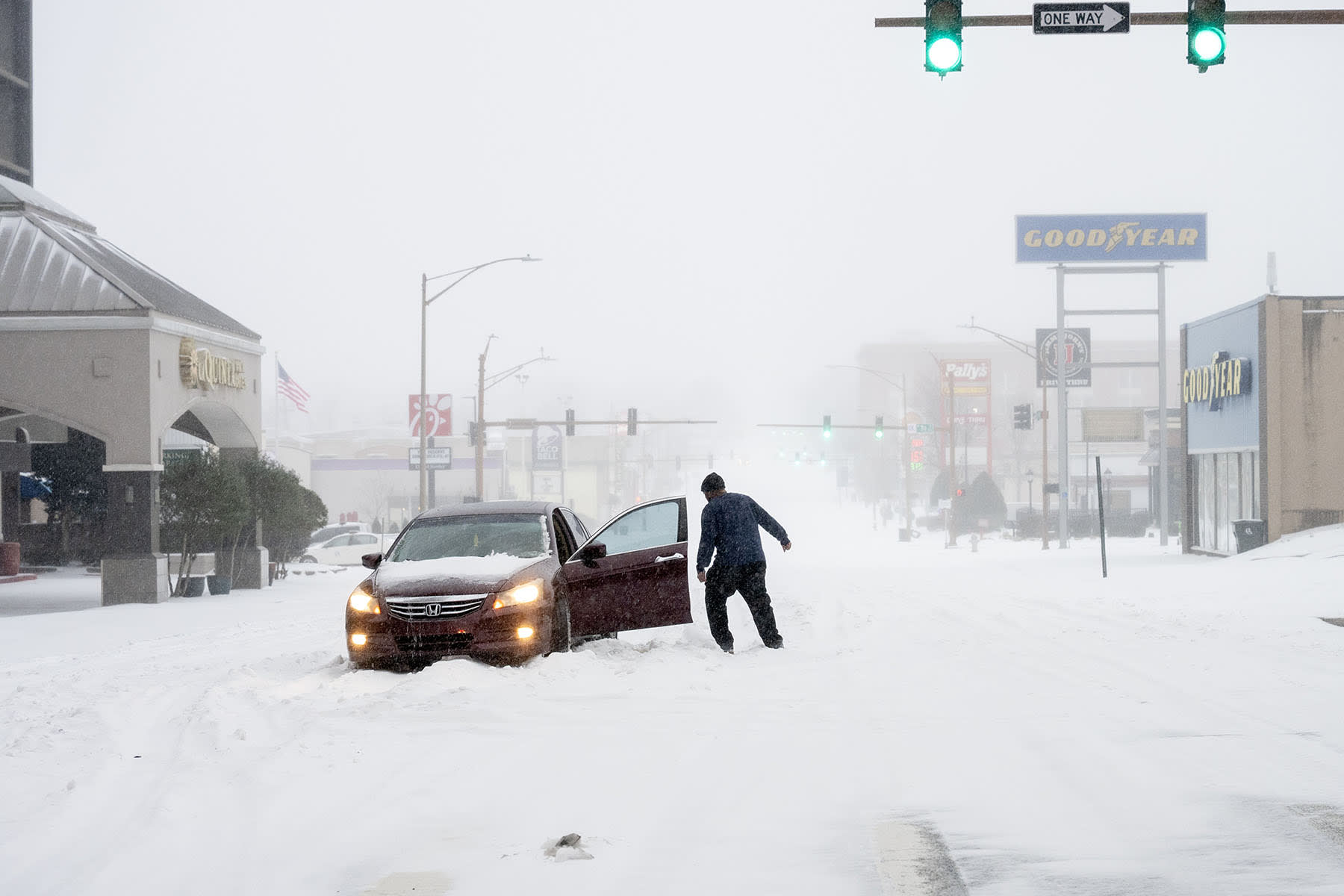 A car stuck in the snow on January 24, 2026 in Little Rock, Arkansas.
