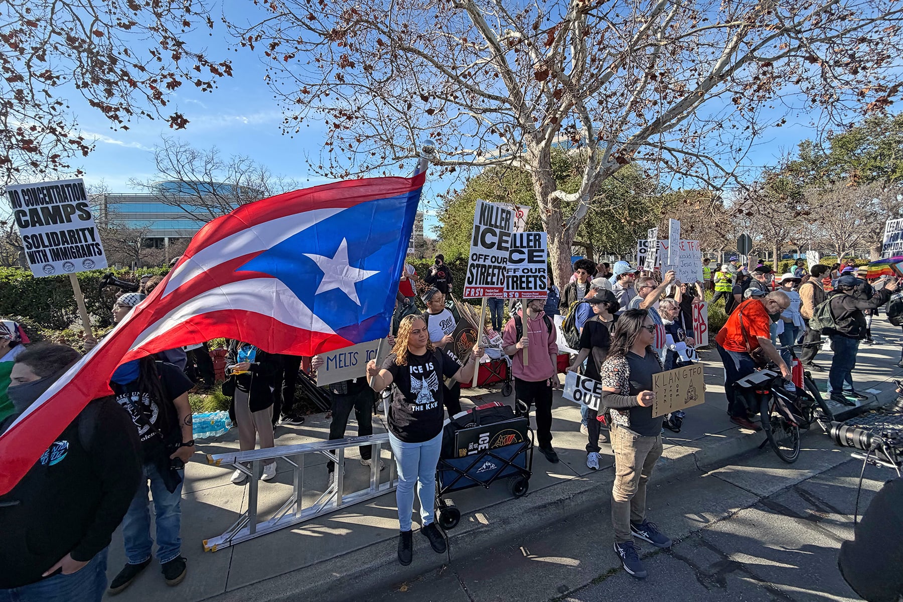 An anti-ICE protest on Mission College Blvd. near the Super Bowl.