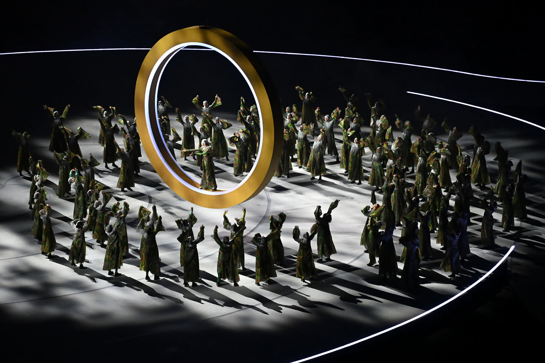 Dancers perform during the opening ceremony of the Milano Cortina 2026 Winter Olympic Games at the San Siro stadium in Milan, northern Italy, on February 6, 2026. 