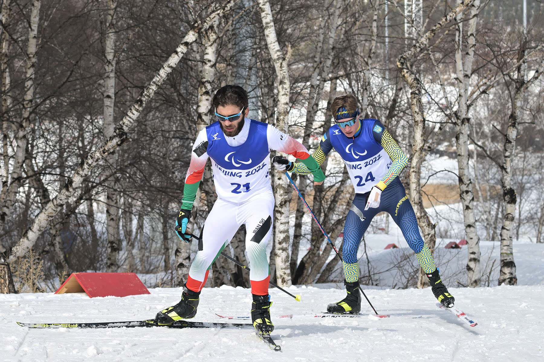 Iran's Aboulfazl Khatibi Mianaei competes in the men's middle distance free technique standing para cross-country skiing final aT the Beijing 2022 Winter Paralympic Games. 