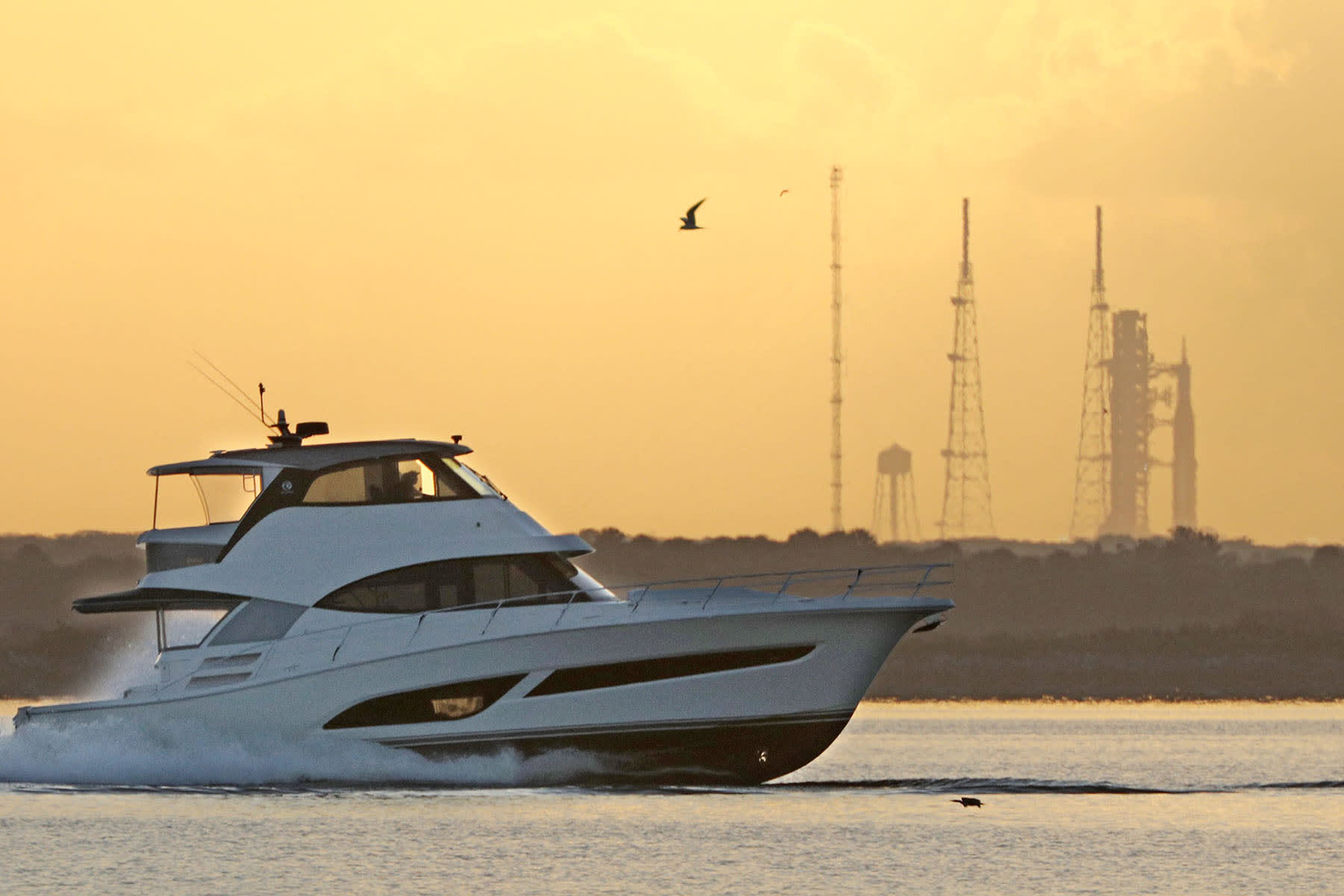 A boat moves along the Indian River