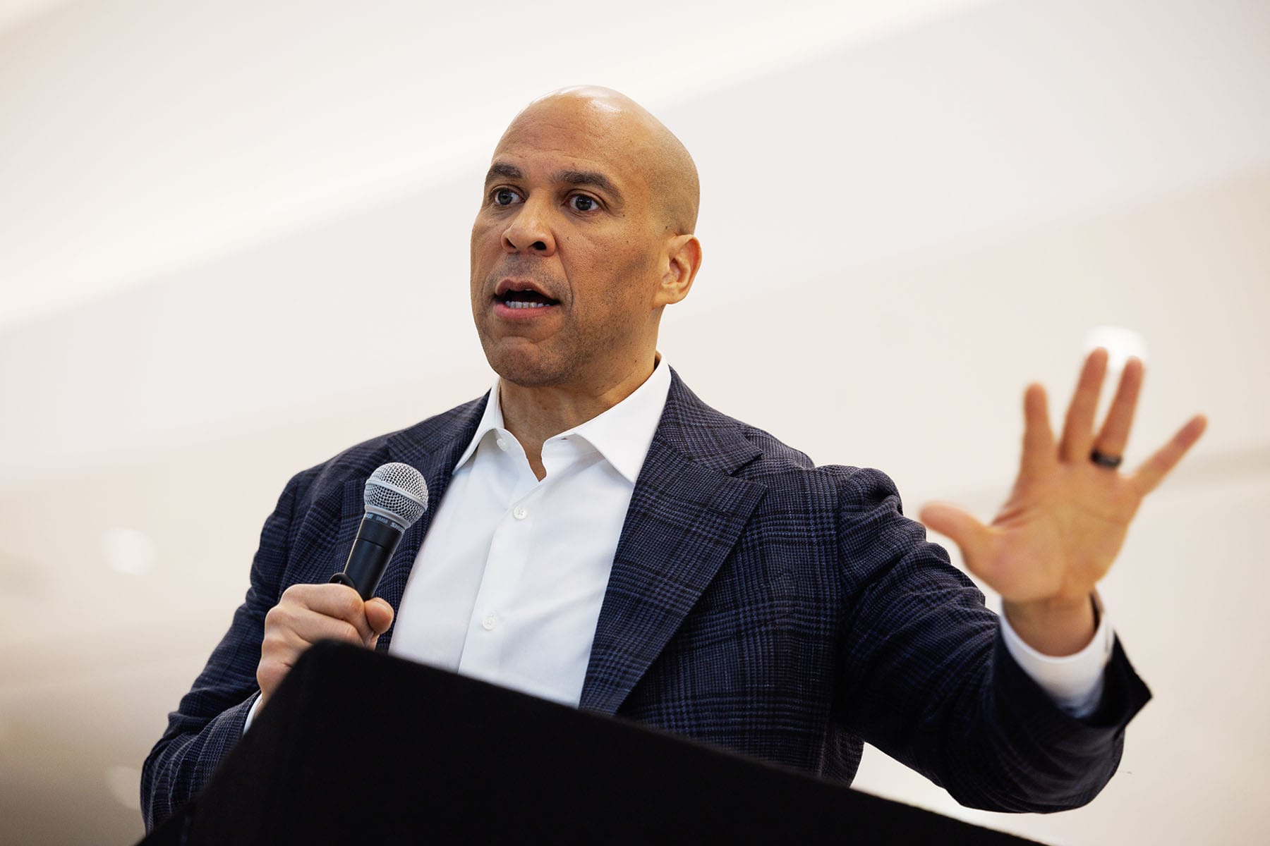 Sen. Cory Booker, D-N.J., speaks at Newark International Airport on March 23, 2026.