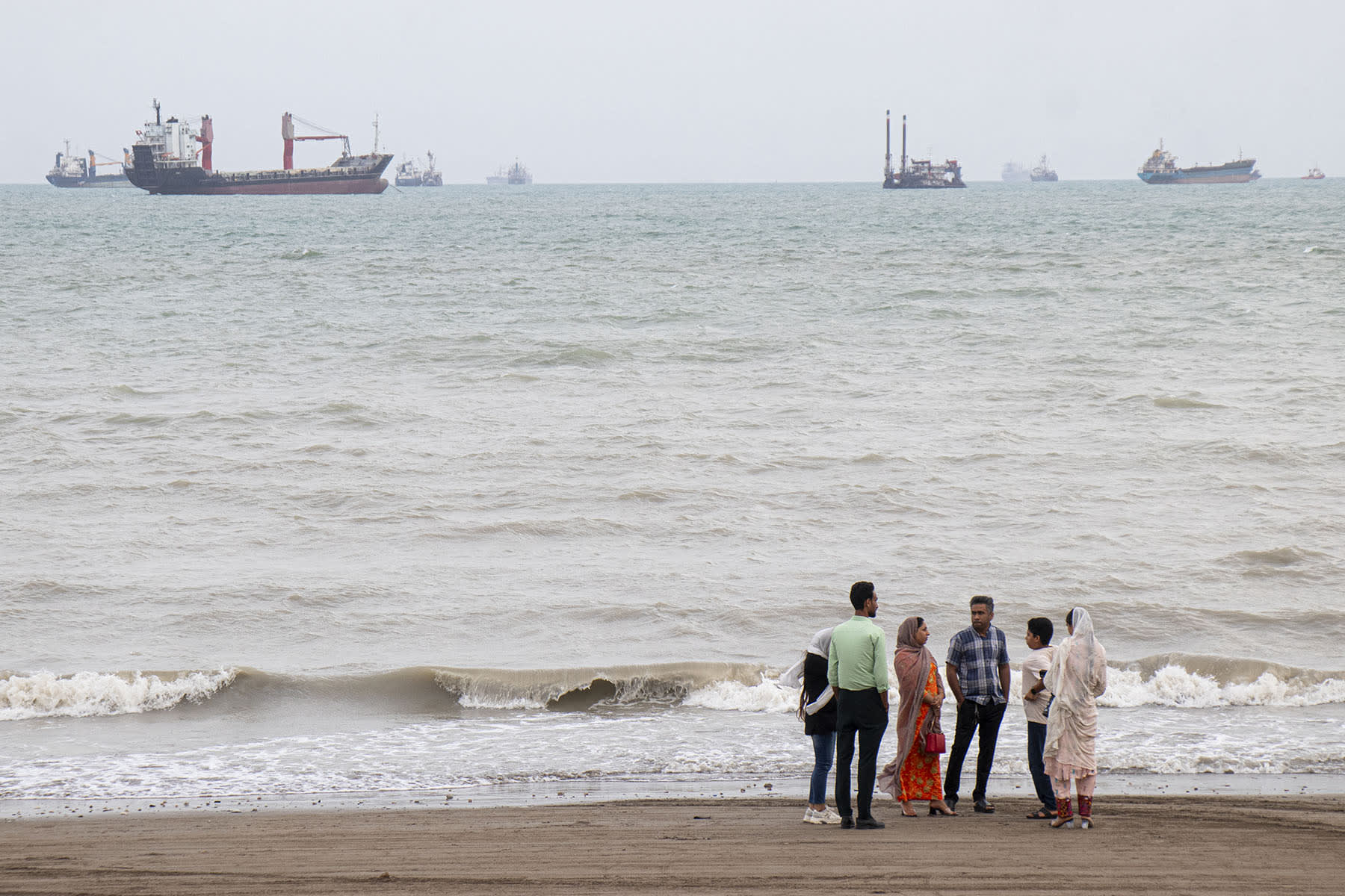Iranians on the beach in Bandar Abbas along the Strait of Hormuz 