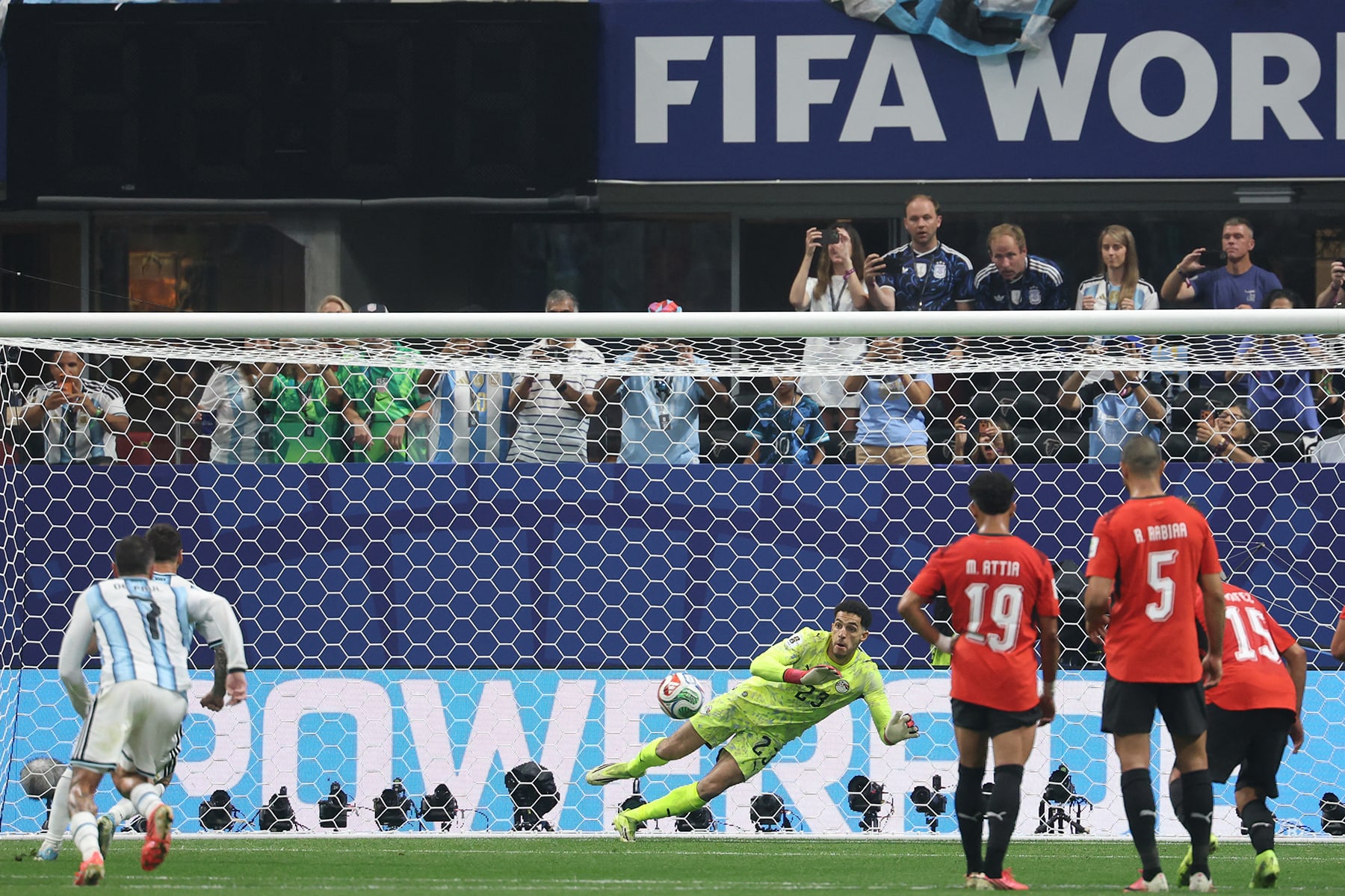 Egypt's goalkeeper Mostafa Shoubir stops a penalty shoot by Argentina's forward Lionel Messi on July 7, 2026.