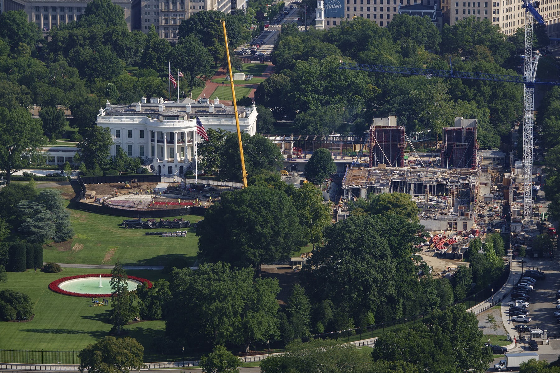 Construction continues on a new helipad on the South Lawn of the White House and the East Wing ballroom on Aug. 6, 2026.