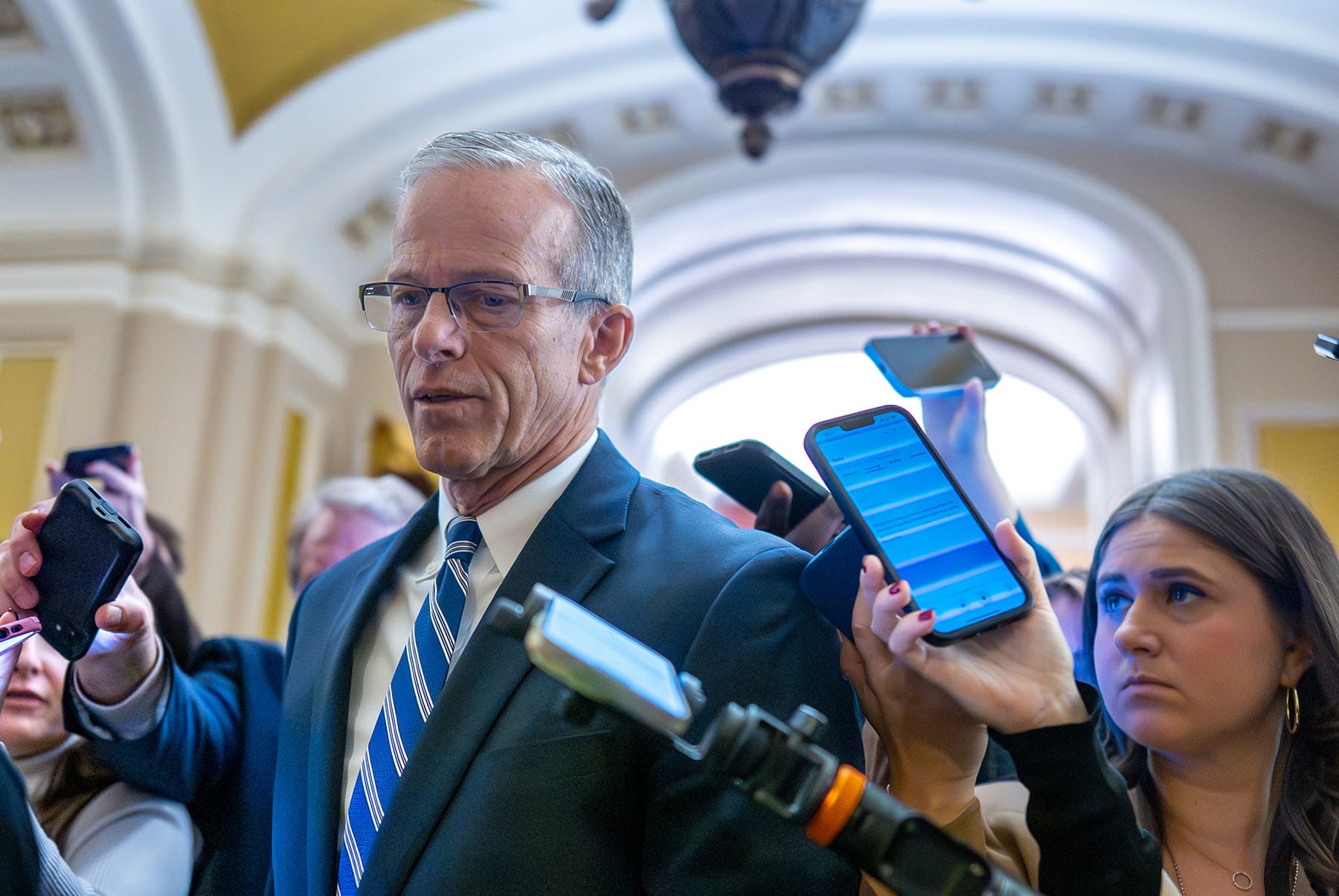 Reporters surround Senate Majority Leader John Thune at the Capitol on Nov. 7, 2025. 