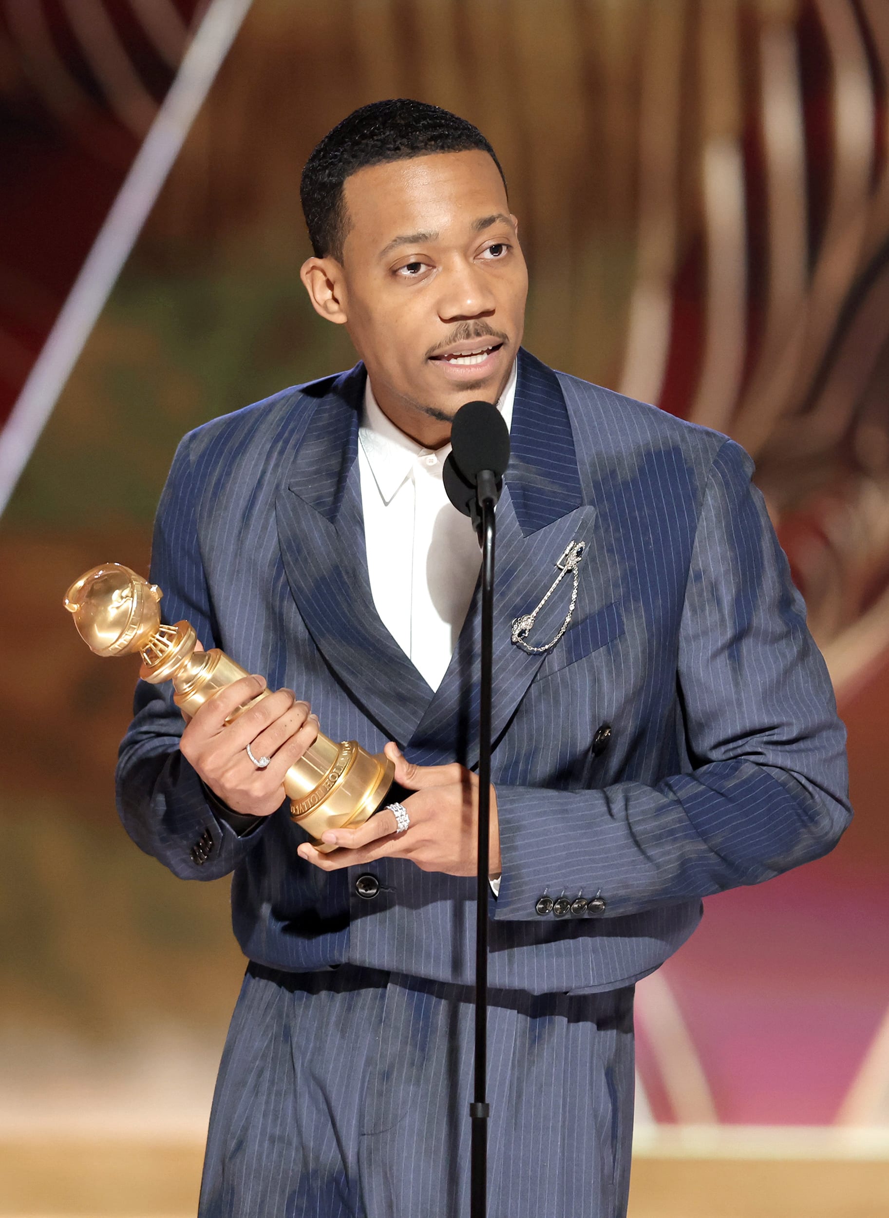 BEVERLY HILLS, CALIFORNIA - JANUARY 10: In this handout photo provided by NBCUniversal Media, LLC, Tyler James Williams accepts the Best Supporting Actor in a Television Series Musical-Comedy or Drama award for "Abbott Elementary" onstage during the 80th Annual Golden Globe Awards at The Beverly Hilton on January 10, 2023 in Beverly Hills, California.
