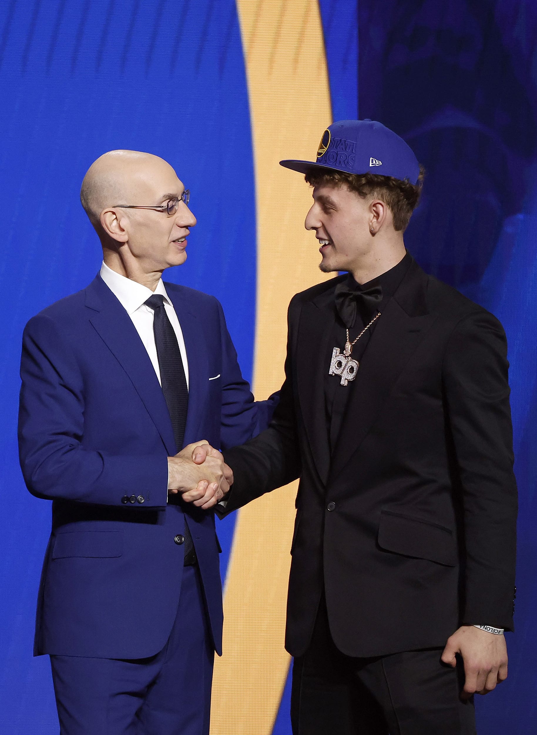 Brandin Podziemski, right, greets NBA commissioner Adam Silver after being drafted 19th overall pick by the Golden State Warriors during the first round of the 2023 NBA Draft at Barclays Center on June 22, 2023, in Brooklyn borough of New York City.