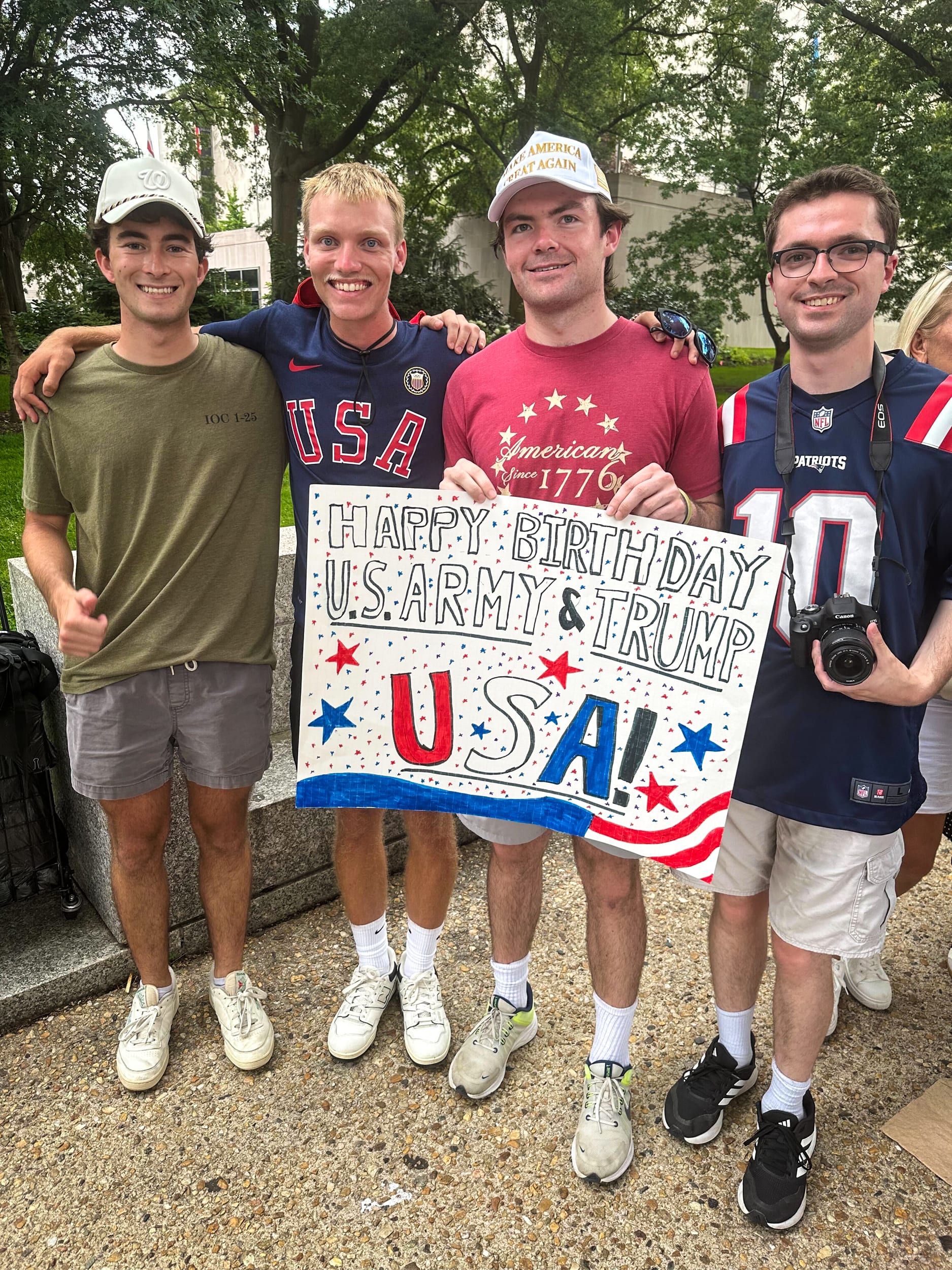 Sam Swartz, a 23-year-old from Jacksonville, Fla., with his friends at the military parade.