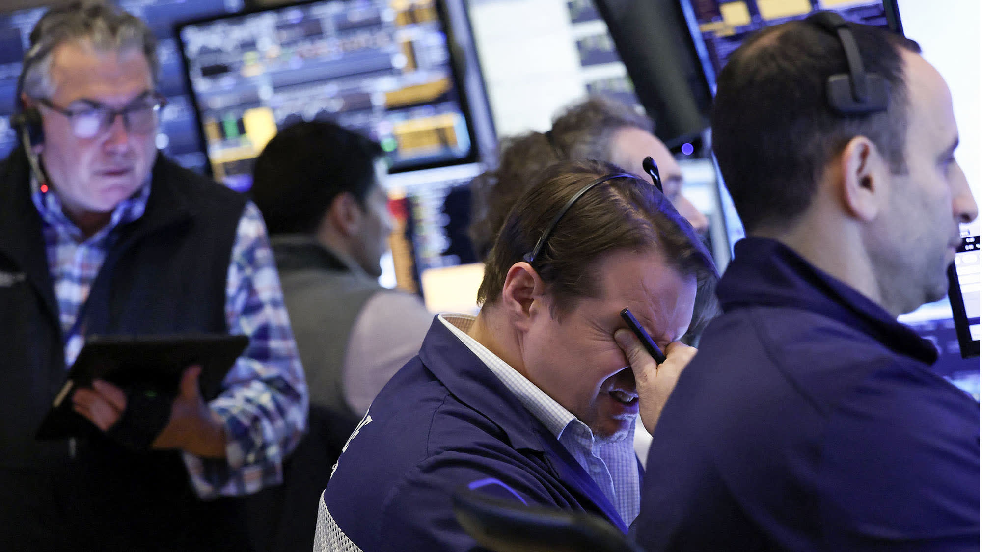 Traders work on the floor of the New York Stock Exchange at the opening bell on April 3, 2025.