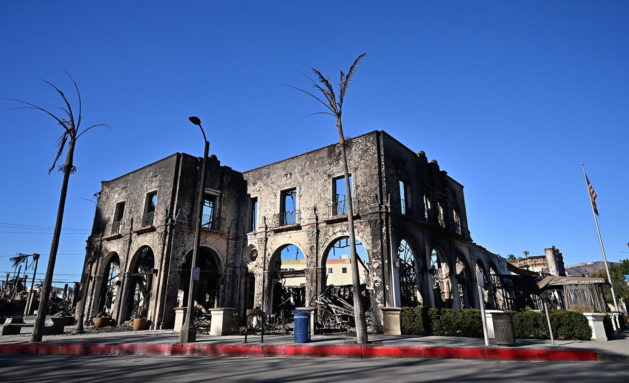 A building that once housed restaurants and coffee shops and other businesses destroyed by the Palisades Fire.