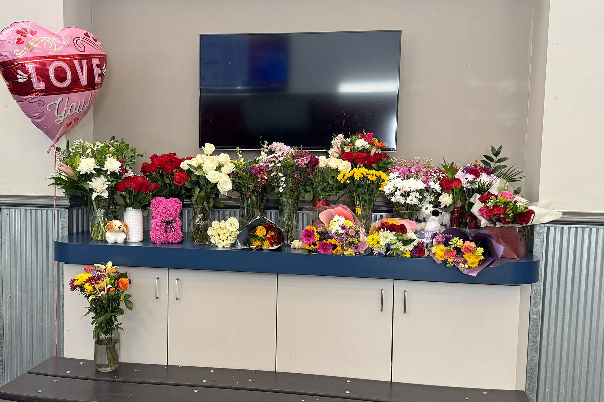 A makeshift memorial to the victims of the American Airlines crash at the Ashburn Ice House.