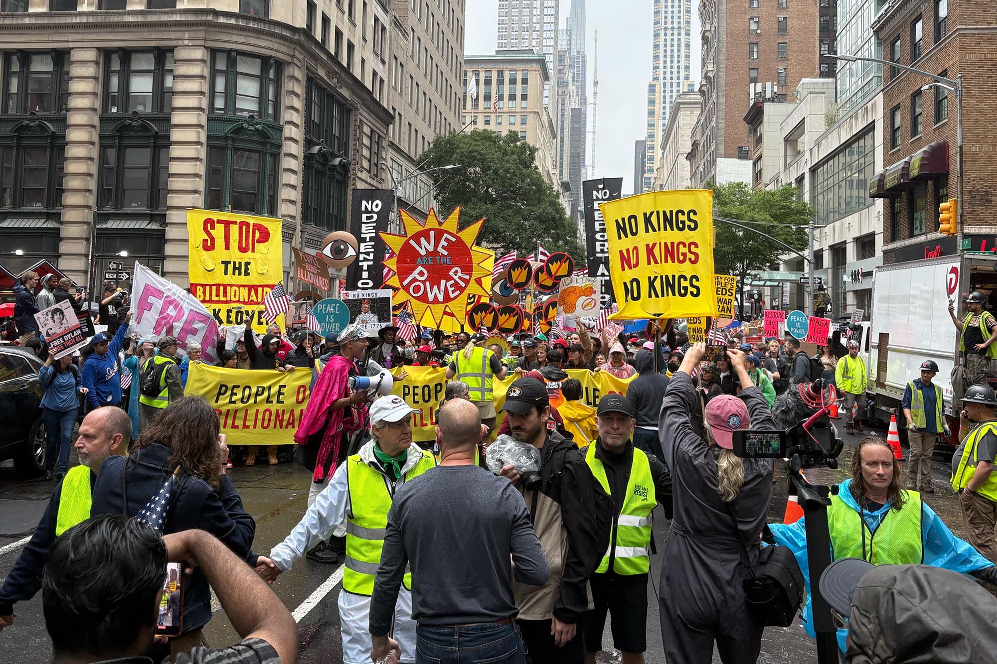 "No Kings Day" protesters march down 5th Avenue in New York.