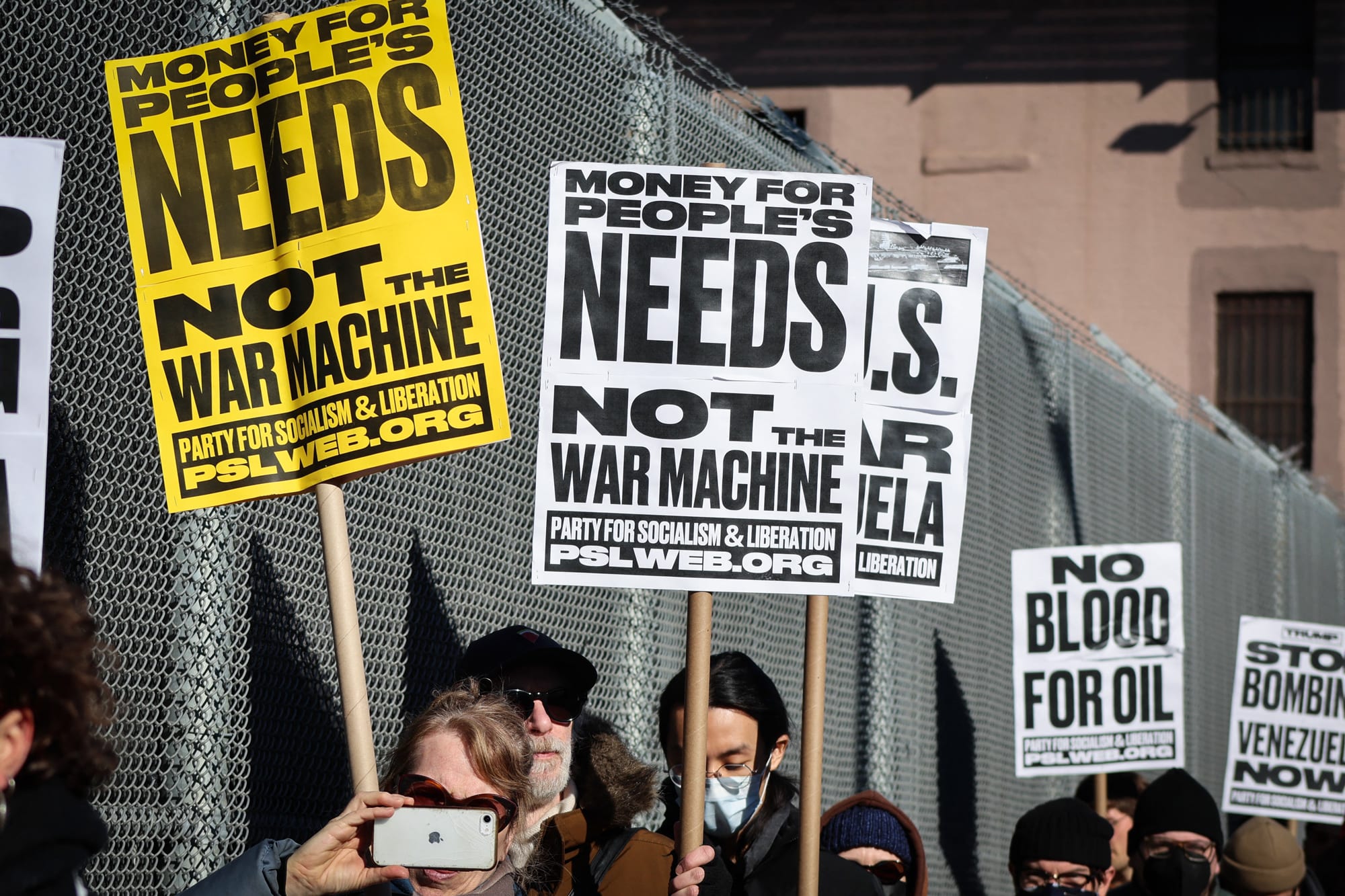 People protest against war in Venezuela outside