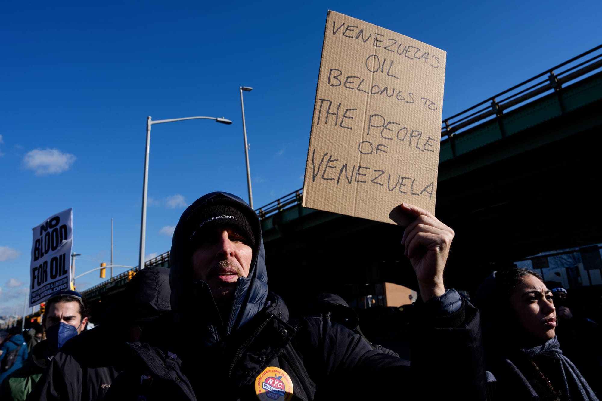 People protest against war in Venezuela outside
