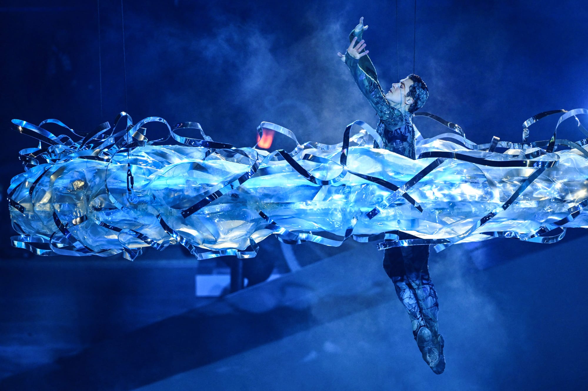 Robert Bolle dances, suspended in the air