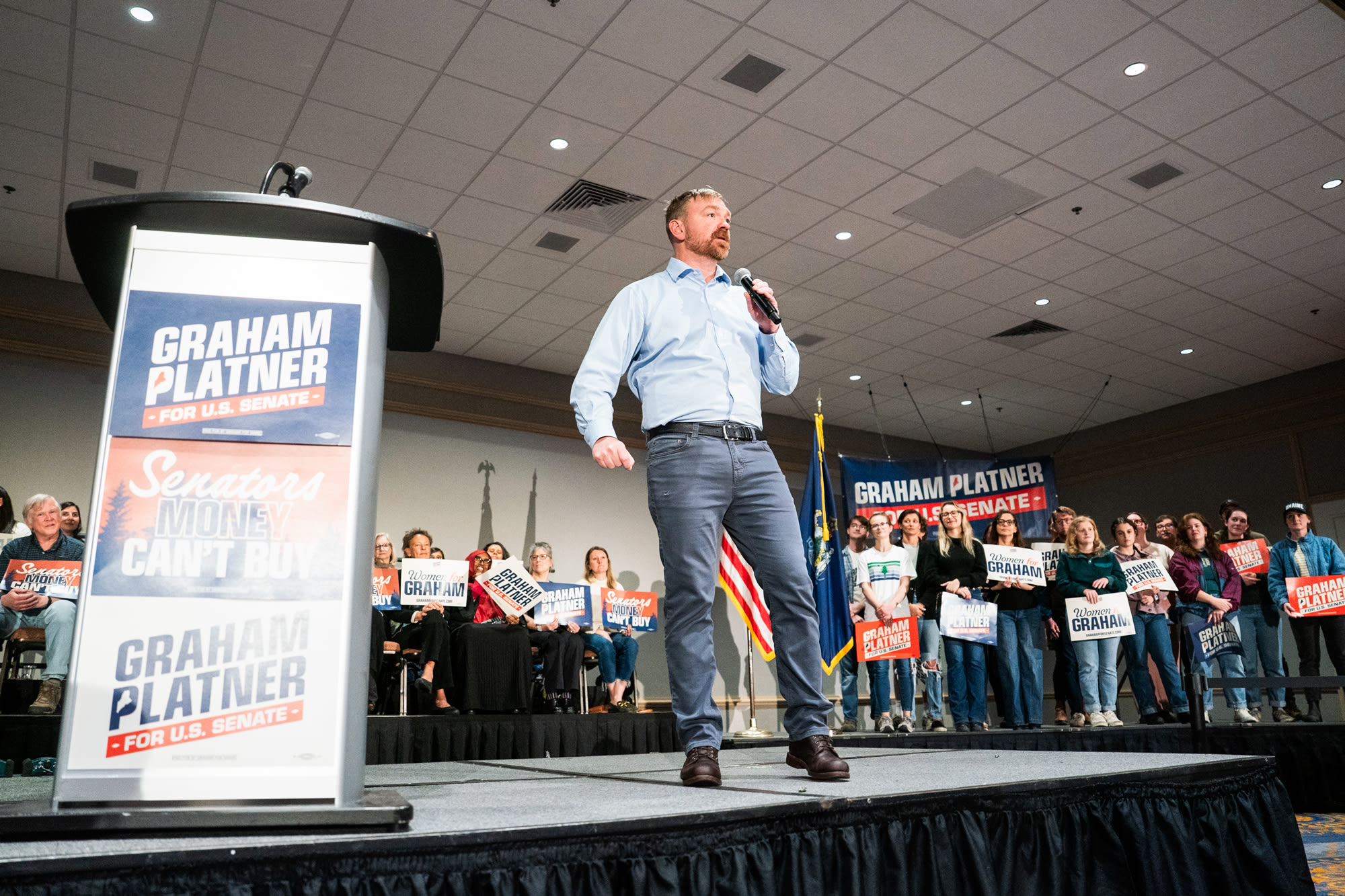 Graham Platner speaks on stage