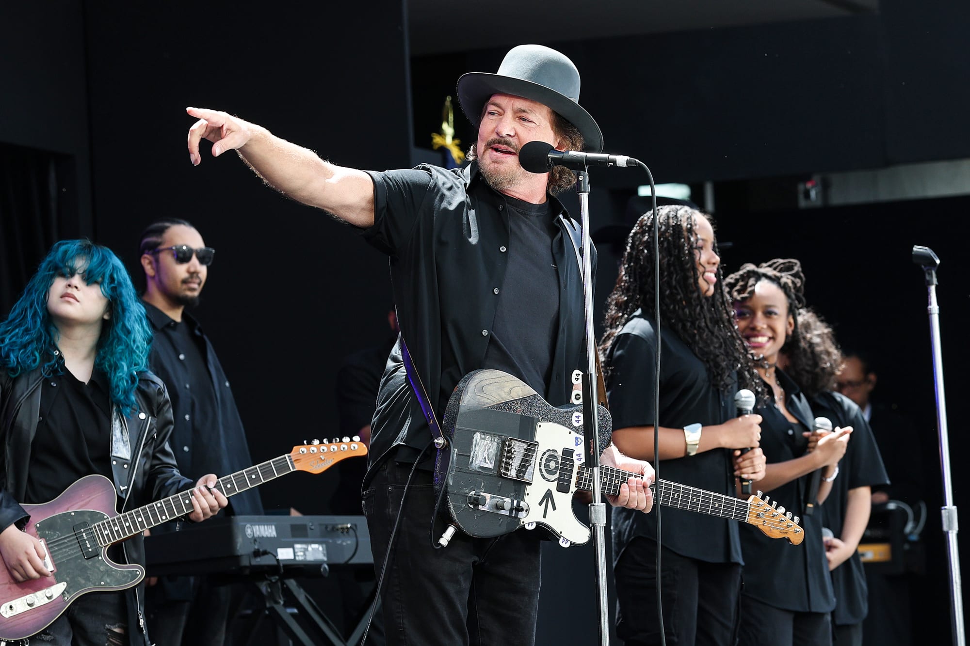 Eddie Vedder sings on stage