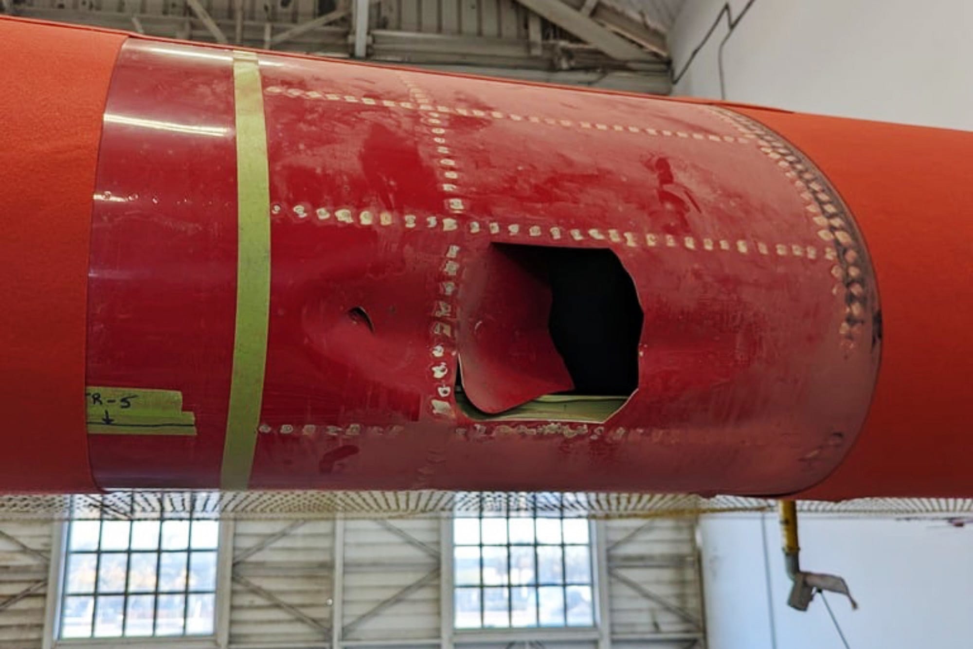 A hole is seen the wing of Canadair CL-415 aircraft, commonly referred to as a "Super Scooper," after it collided with a drone.
