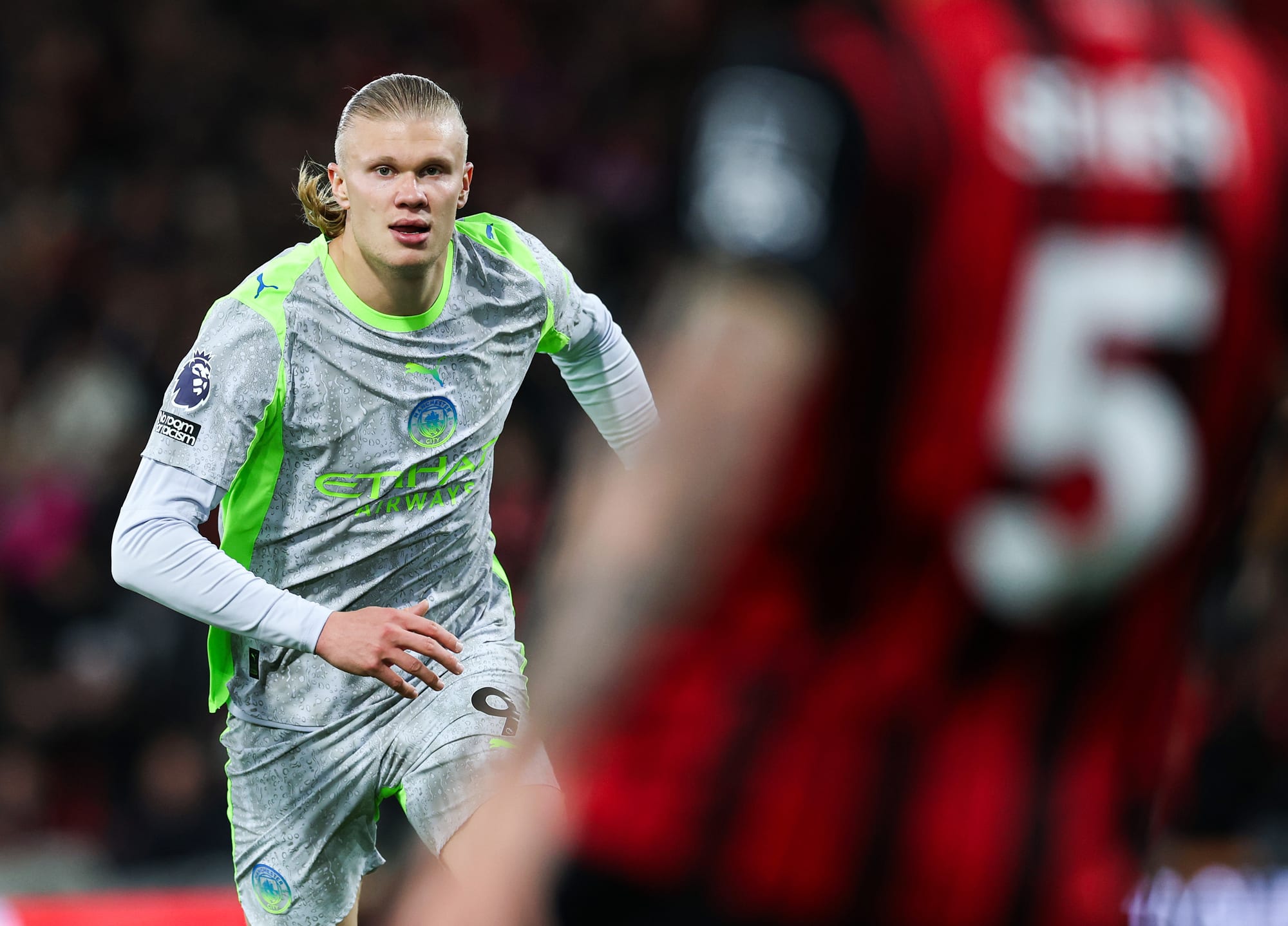 Erling Haaland runs on the soccer field