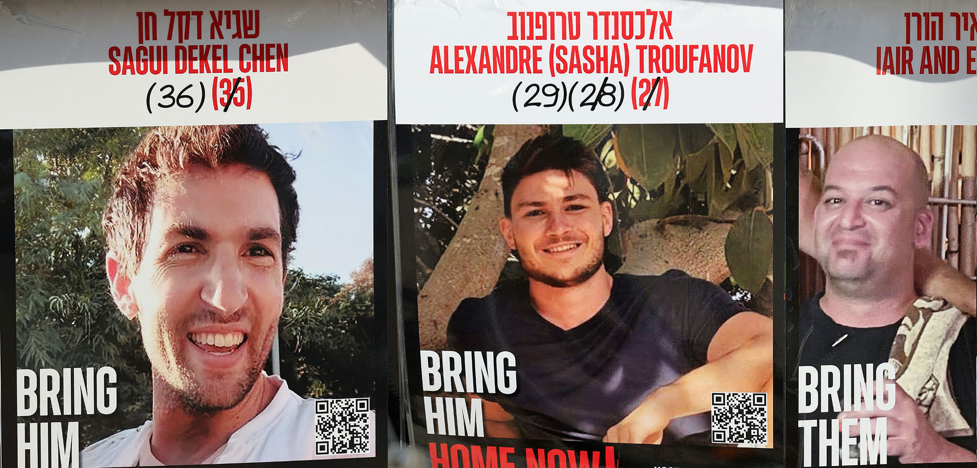 Posters of three Israeli hostages held in the Gaza Strip: Sagui Dekel-Chen, Sasha Trupanov and Yair Horn. 