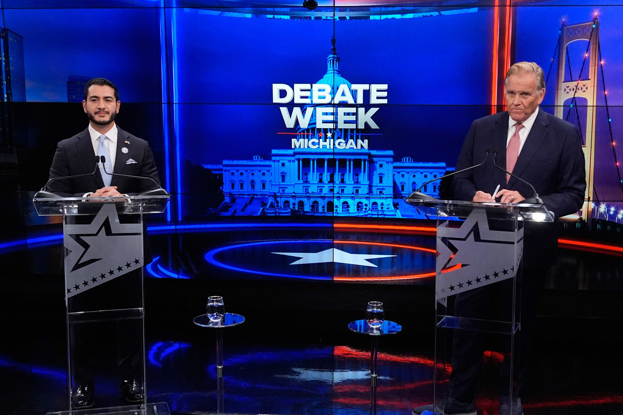 Democratic nominee for U.S. Senate Abdul El-Sayed, left, appears with Republican nominee Mike Rogers during a televised debate on Oct. 8, 2026, in Grand Rapids, Mich.