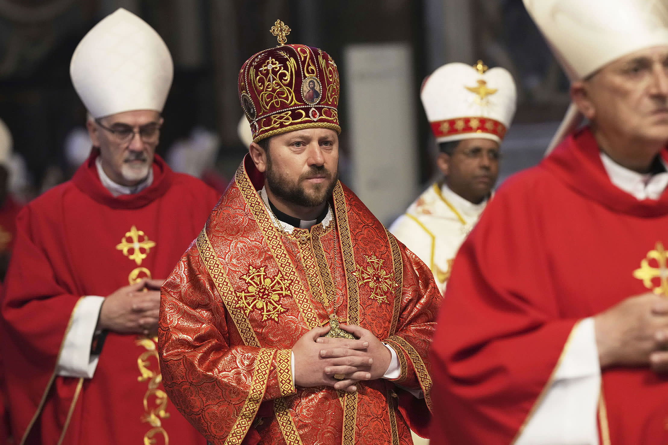 Cardinal Mykola Bychok arrives in procession for a mass on the seventh of nine days of mourning for late Pope Francis, in St. Peter's Basilica, at the Vatican.